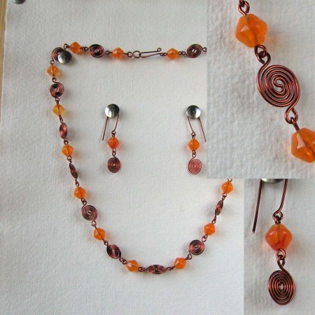 Měděná spirála - oranžový korálek